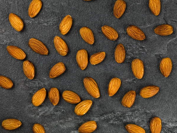 Patrón de tuercas de almendras asadas — Foto de Stock