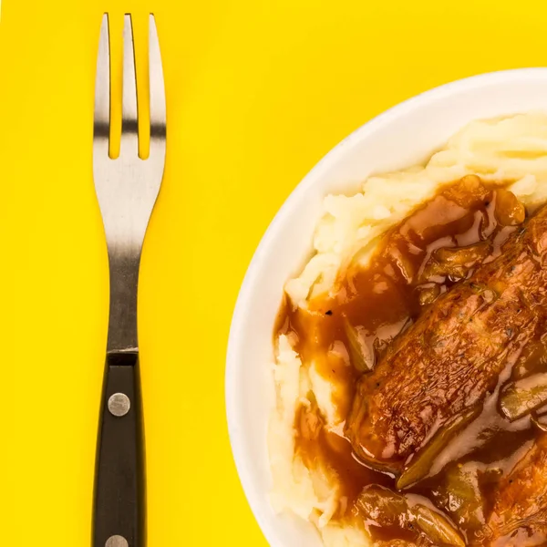 Sausage And Mashed Potatoes With Onion Gravy — Stock Photo, Image