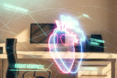 Masaüstü ofis arka plan ile kalp hologramı. Çifte pozlama. Tıp eğitimi kavramı