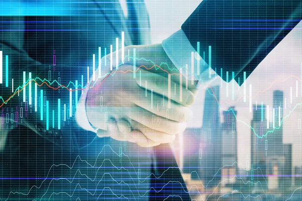 Double exposure of financial graph on cityscape background with two businessman handshake. Concept of stock market deal