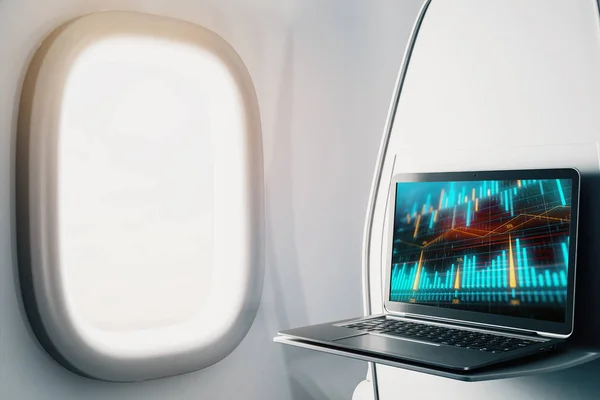 Ноутбук крупным планом внутри самолета с форекс график на экране. Концепция торговли на финансовом рынке. 3d-рендеринг . — стоковое фото