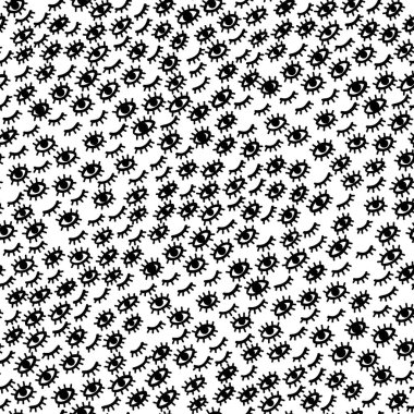 Gözleri olan siyah ve beyaz desenli.