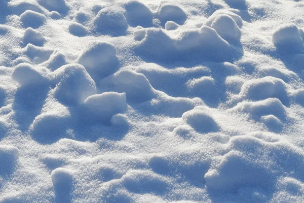 Текстура снега и комки — стоковое фото