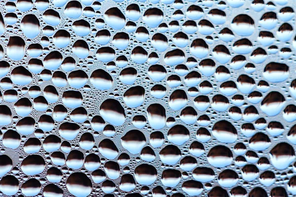 Gotas de niebla matutina sobre vidrio redondo — Foto de Stock