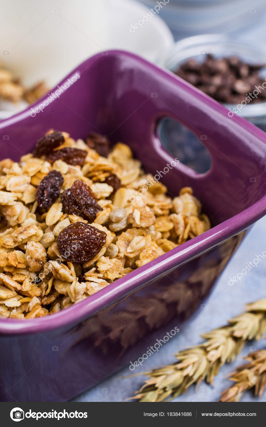 Traditional granola with raisins Stock Photo by ©Shusha 183841686