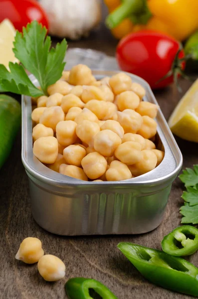 Canned chickpeas in a tin
