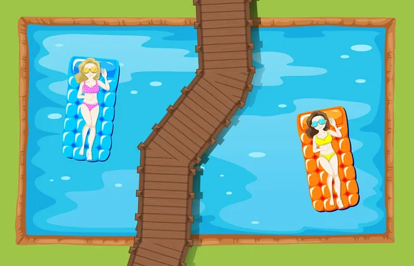 Two women on floating mat in the pool