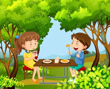 İki kız ormanda piknik