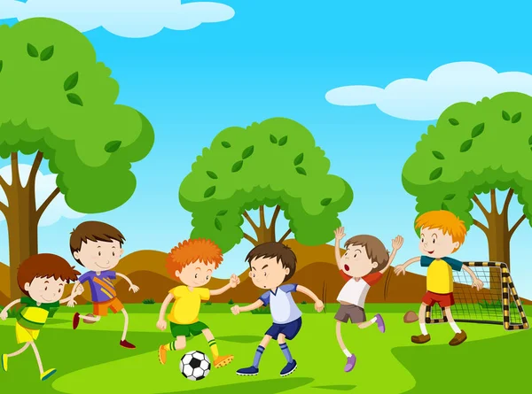 Chicos jugando al fútbol en el parque — Vector de stock