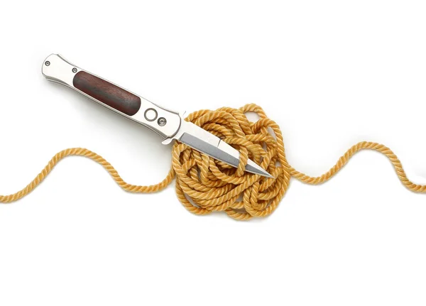 Gordian knot with knife. — Stock Photo, Image