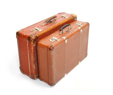 Beyaz izole retro tarzı seyahat çantası.