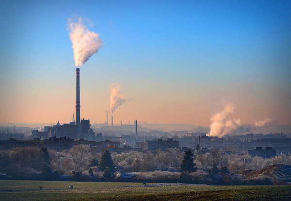 Smoking stack from lignite combined heat and power plant (Pilsen). Digital artwork on air pollution and climate change theme. Power and fuel generation in Czech Republic, European Union.