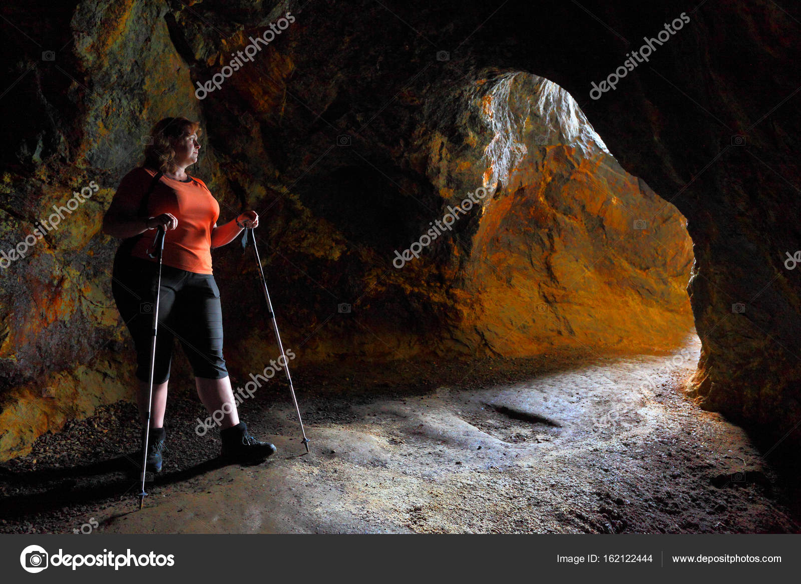 Woman explore ancient underground mine — Stock Photo © vladvitek #162122444