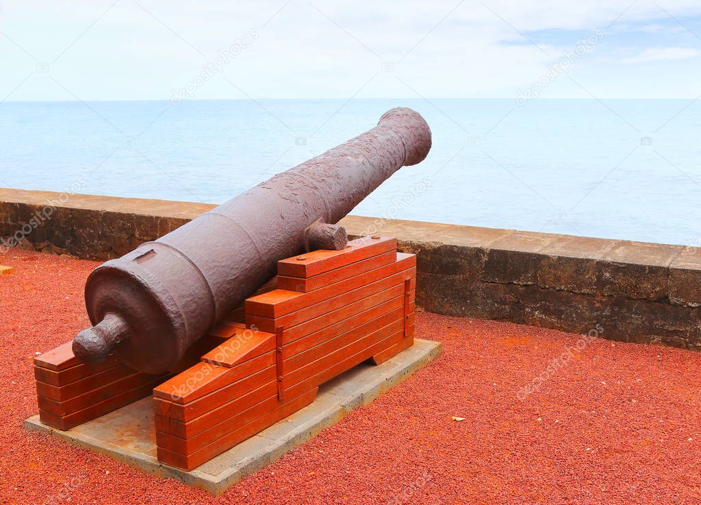 Old navy cannons on waterfront in Saint-Denis