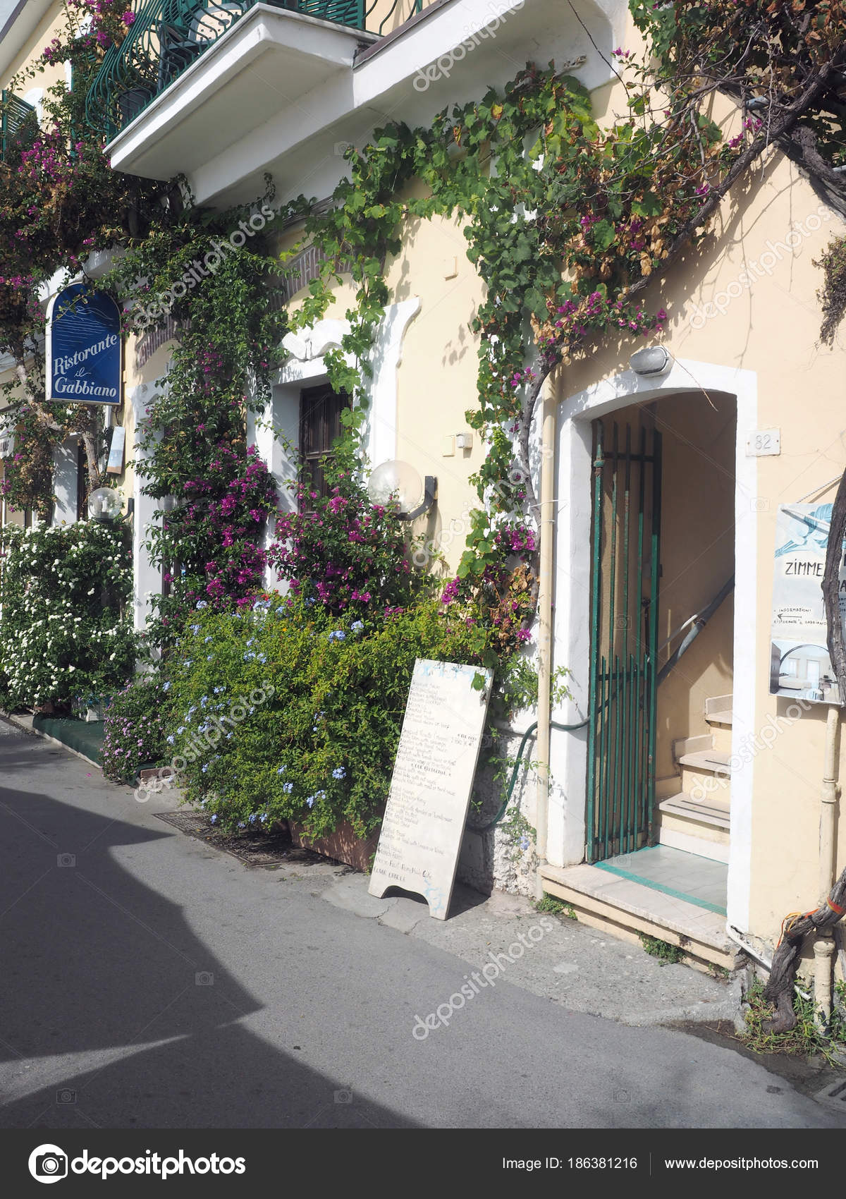 Editorial Flowers On Buiding Entrance To Restaurant And