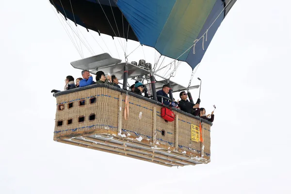 Asian Tourist group  inside Hot Air Balloon basket and flying over fairy chimneys — Stock Photo, Image