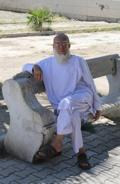 Unidentified Afghan Man sitting in shades and posing — Stock Photo, Image