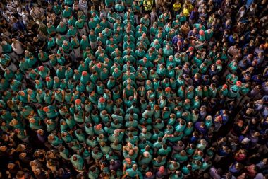 Reus, Spain. August 2017: Castells Performance, a castell is a human tower built traditionally in festivals within Catalonia. This is also on the UNESCO Intangible Cultural Heritage of Humanity clipart