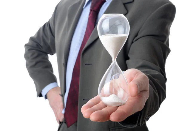 Businessman holding hourglass — Stock Photo, Image