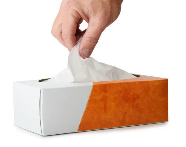 Hand picking out a tissue — Stock Photo, Image