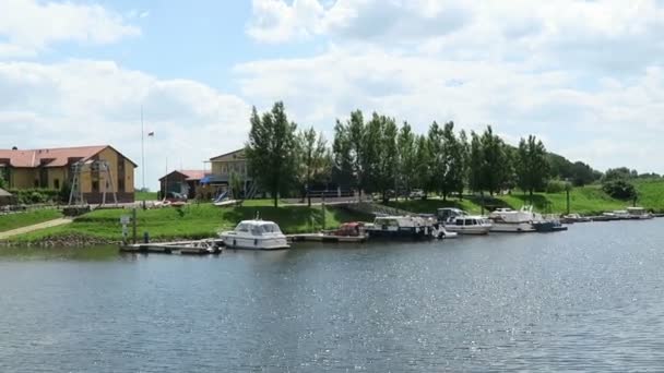 Harbor of Tangermuende with boats and houses. camera pan. — Stock Video