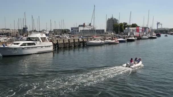 The marina of Warnemuende and parts of the old town can be seen. Filmed from the boat. — Stock Video