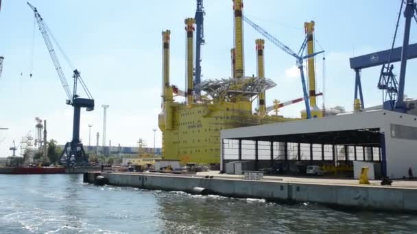 Warnow shipyards and portions of drilling platform Borwin Beta which is under construction. Located at Warnemuende — Stock Video