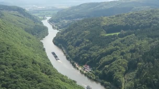 View over the Saar river loop next to Mettlach in Saarland (Germany). Barge ships driving on river. — Stock Video