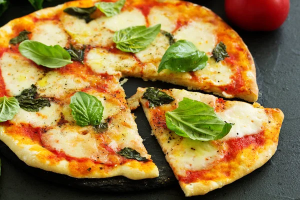Homemade pizza margarita. Selective focus.