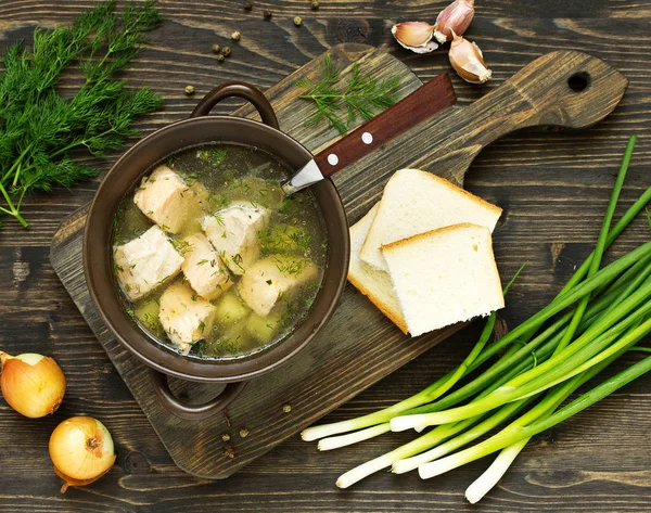 fish soup with ingredients and spices for cooking.