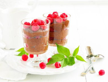 Chocolate mousse with raspberries. Selective focus. clipart
