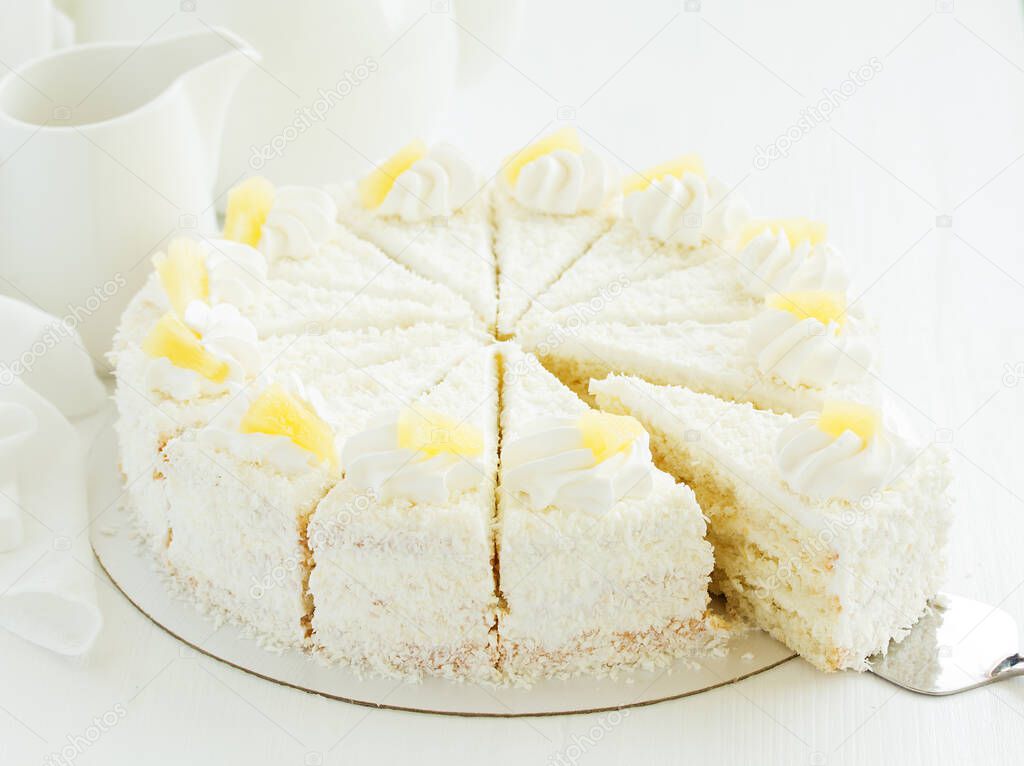 cake with coconut and pineapple. selective focus.