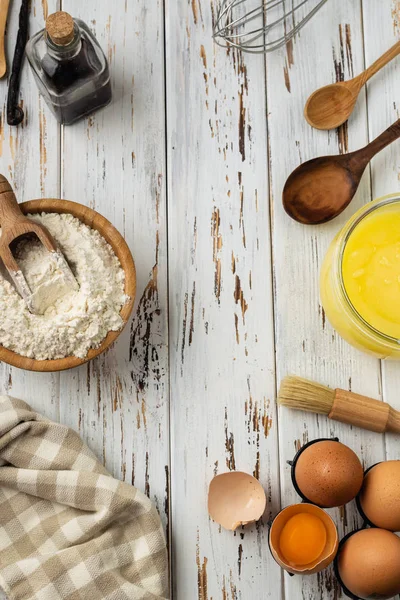 Baking pastry background vertical, ingredients, kitchen utensils