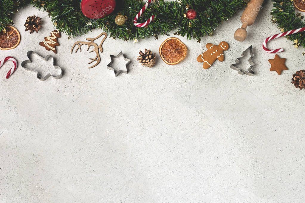 Christmas composition flat lay, tinsel, gingerbread, cookie cutt