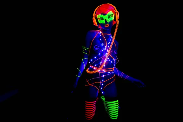 グロー uv ネオン セクシーなディスコ女性サイバー人形 — ストック写真