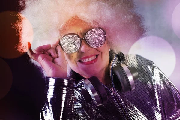 Grandma partying disco — стоковое фото