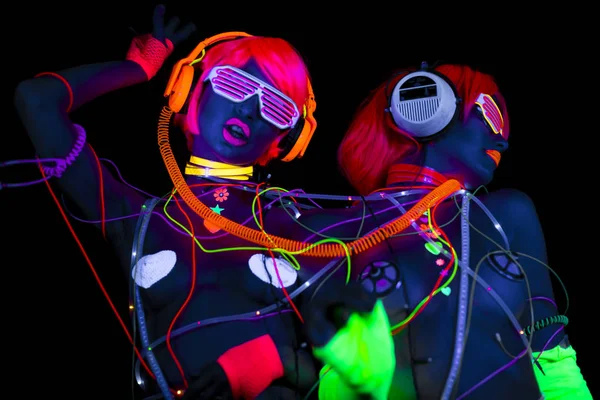 Gloed uv neon sexy disco vrouwelijke cyber pop — Stockfoto