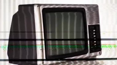 multiple vintage and retro televisions spinning with glitch effect 
