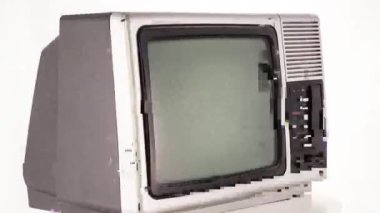 multiple vintage and retro televisions spinning with glitch, interference and noise effects