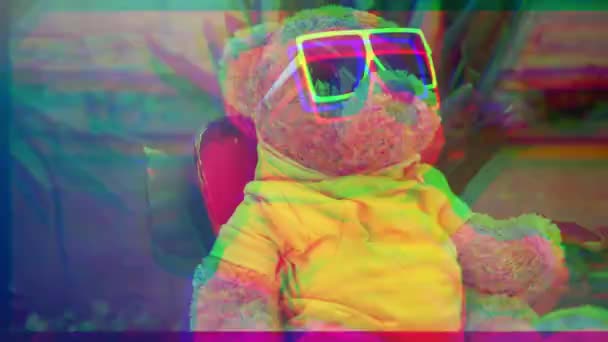 Cool Brown Teddy Bear Fluffy Toy Sunglasses Sitting Chair Balcony — Stock Video