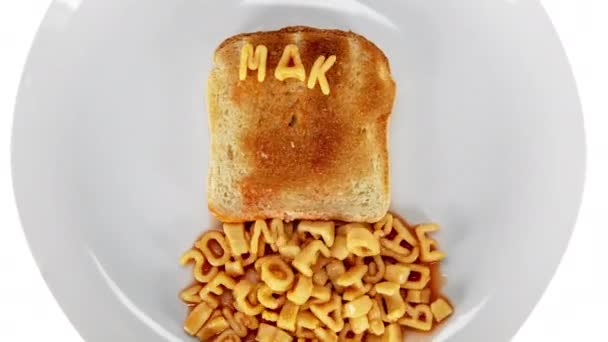 Spaghetti Letters Make Toast War Crispy Fried Piece Bread White — Stock Video