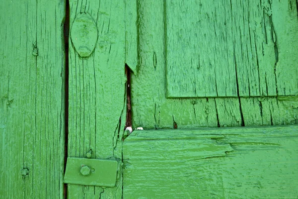 Kawałek drewna maskują zielony jako okno w lanzarote — Zdjęcie stockowe