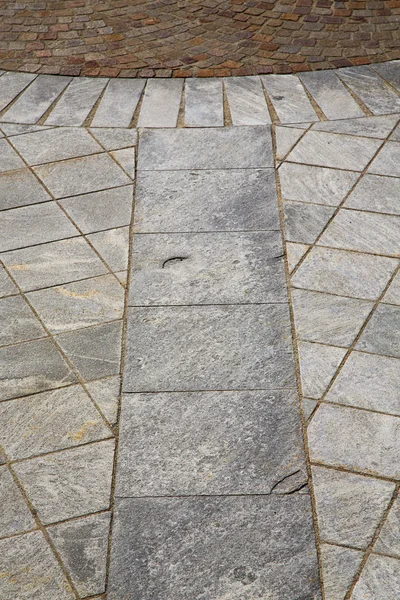 Brick in casorate sempione  abstract   pavement of   curch and m — Stock Photo, Image