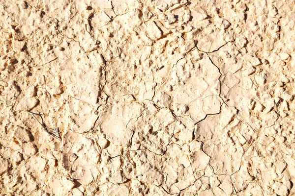 In einer abstrakten, rissigen Sandstruktur — Stockfoto