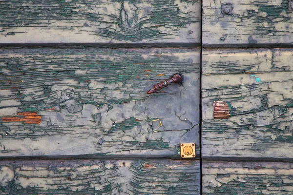 Sumirago cross    brown knocker in    wood door   varese italy — Stock Photo, Image
