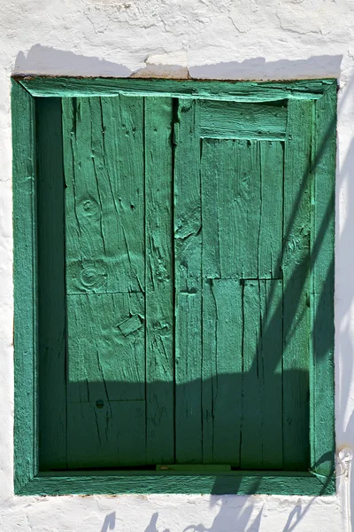 Spain green wood   window white wall arrecife — Stock Photo, Image