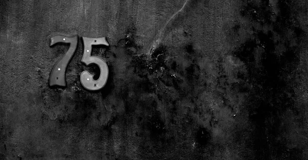 Αριθμός σε ένα σπίτι τοίχο σαν υφή φόντου — Φωτογραφία Αρχείου