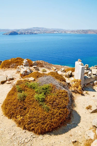 Zee in delos Griekenland de historycal Akropolis en oude ruïne site — Stockfoto