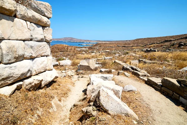 Famoso em delos greece o acropolis histórico e ruína velha s — Fotografia de Stock