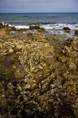  Lanzarote Adası köpük taş gökyüzü bulut plaj su  
